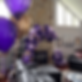 Purple Birthday Balloon Arch over fireplace by Eye Candy Balloons
